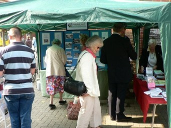 Manning our stall at community events